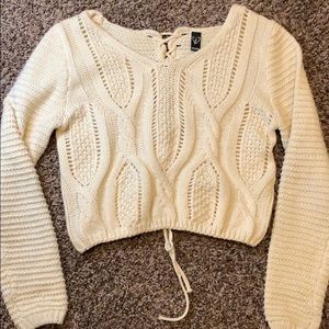 Tan colored see-through sweater